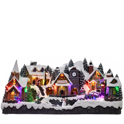 estación de tren navideña iluminada con movimiento y sonido