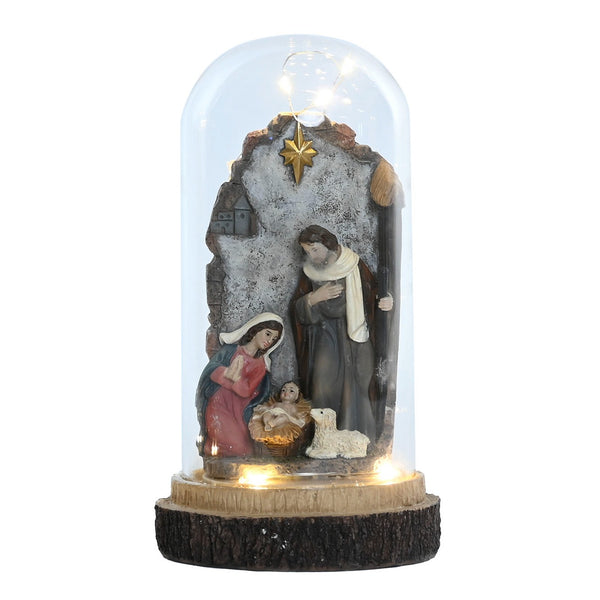 Figura iluminada de la Sagrada Familia con fondo rústico de establo