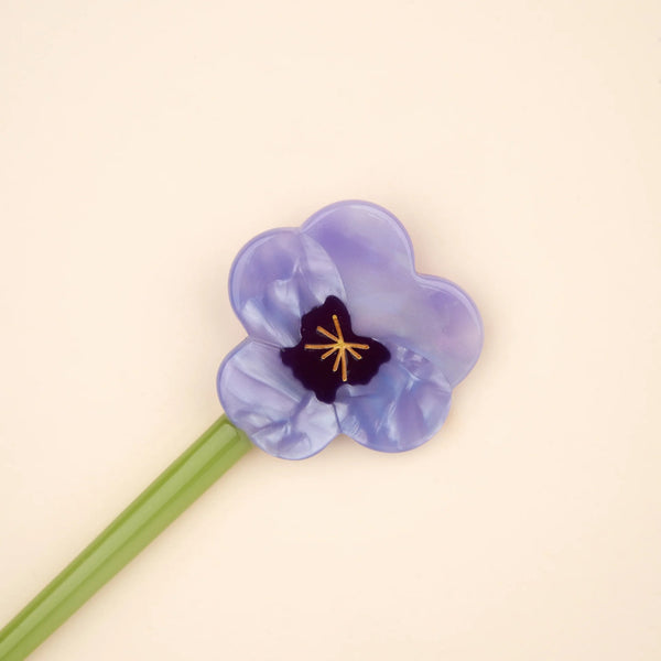Palo para moño con flor lila y varilla verde