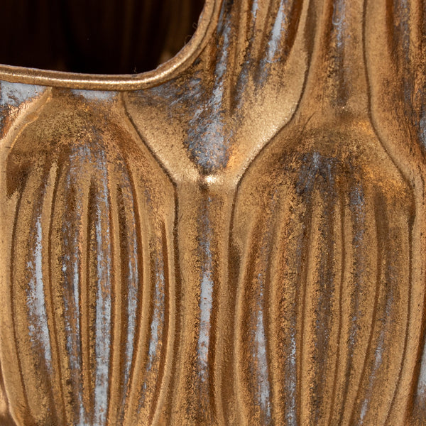 Paragüero cilíndrico dorado con asas troqueladas