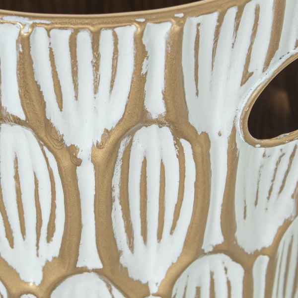 detalle textura relieve blanco y dorado del paragüero de metal elegante - Brocantia tienda de regalos singulares