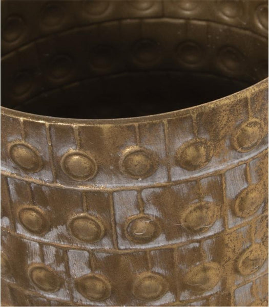 detalle textura en relieve paragüero dorado