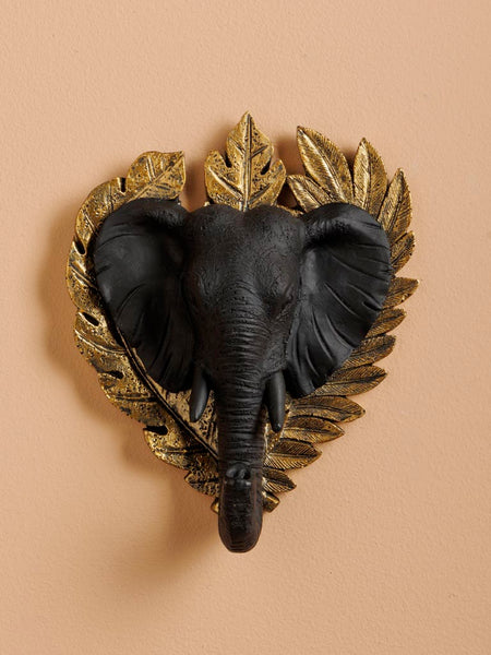 Decoración mural de elefante negro con hojas doradas