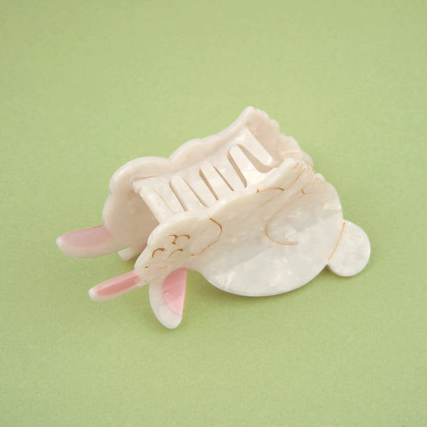 Vista lateral de pinza conejo con mecanismo de sujeción