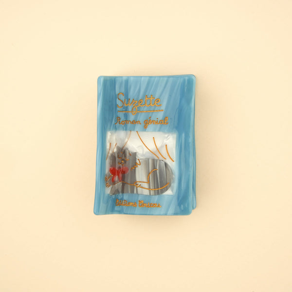 Pinza para el pelo libro