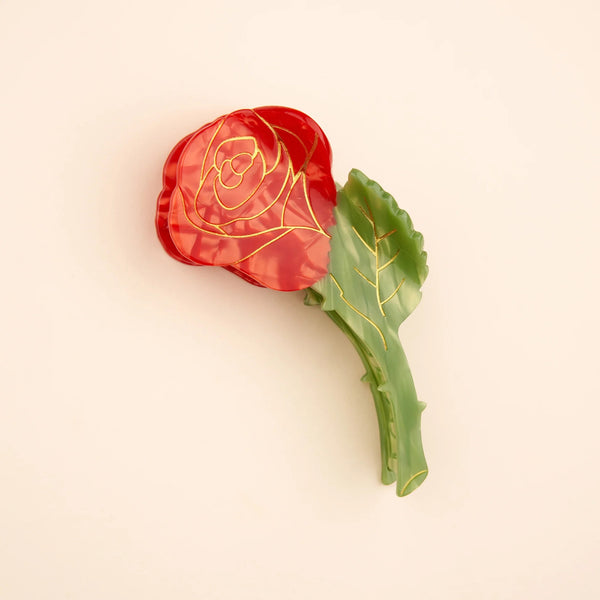 Detalle pinza Coucou Suzette flor roja