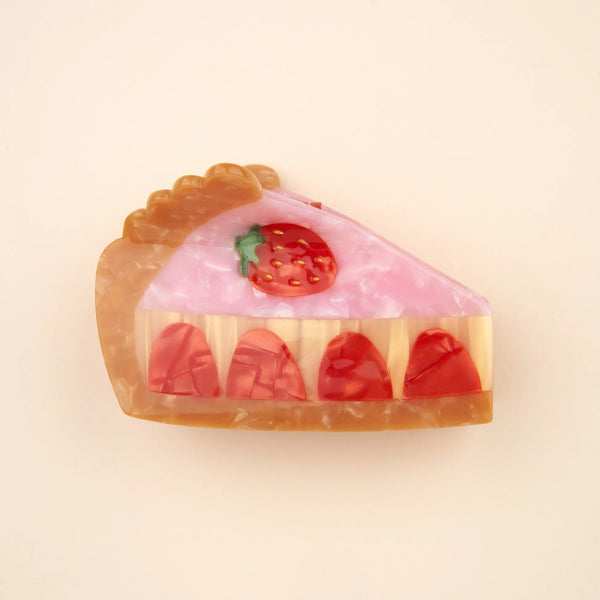 Detalle pinza pelo diseño dulce en mano