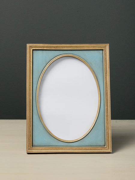 Marco elegante azul celeste y dorado para retrato