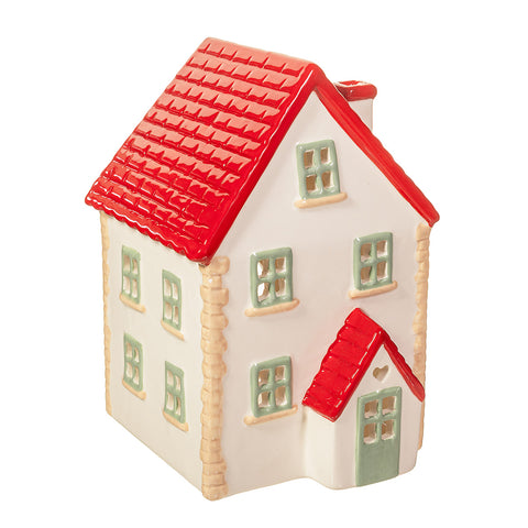 Portavelas en forma de casita con tejado rojo, cerámica decorativa Brocantia.