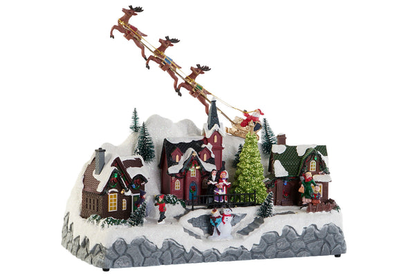 pueblo navideño iluminado con trineo de Papá Noel y luces LED