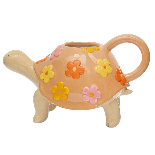 Regadera de cerámica con forma de tortuga decorada con flores, ideal para plantas de interior y exterior