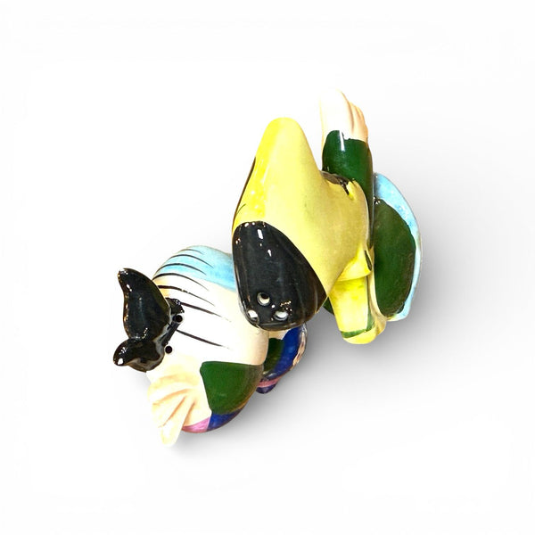 Detalle salpimenteros decorativos de cerámica brillante