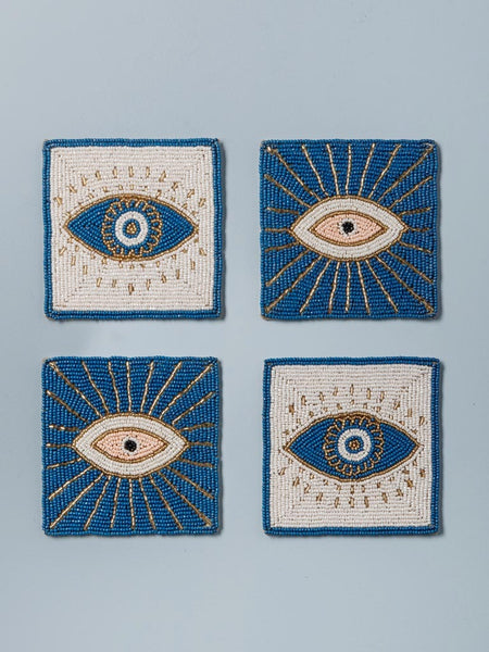 Set completo de posavasos artesanales con ojos bordados