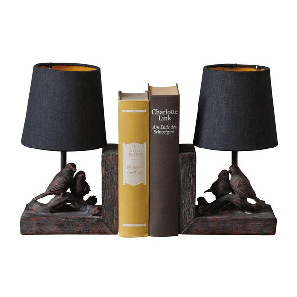 sujetalibros decorativos con lámparas y pájaros