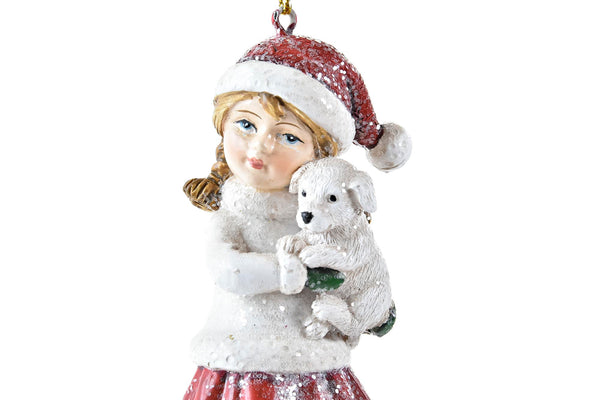 figura navideña niña con perro blanco decoración