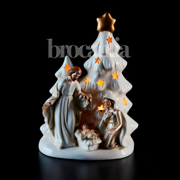 belén cerámico iluminado con vela y diseño artesanal