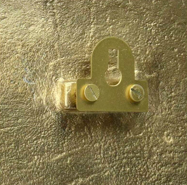 Reloj metal dorado textura